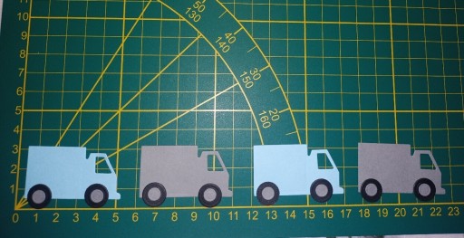 Zdjęcie oferty: Papierowe scrapki - ciężarówki zestaw 4szt.