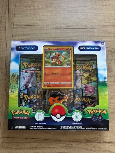 Zdjęcie oferty: Karta karty pokemon Charmander Pin box pokemon Go
