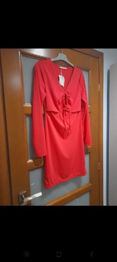 Zdjęcie oferty: Piękna sukienka SinSay z wycięciami r.L NOWA