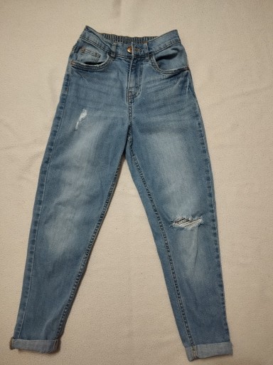 Zdjęcie oferty: Spodnie jeansowe 134