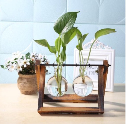 Zdjęcie oferty: Szklany wazon z drewnianą podstawą 