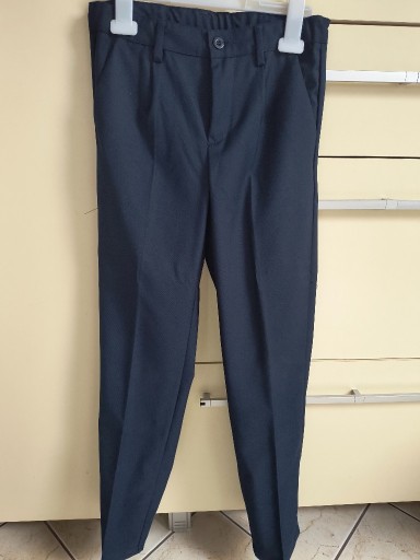 Zdjęcie oferty: Spodnie garniturowe Coccodrillo rozm. 152cm