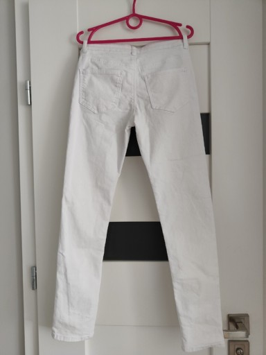 Zdjęcie oferty: Białe spodnie H&M 140 cm rurki 