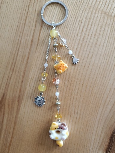 Zdjęcie oferty: Breloczek kot donut I kot tost, pomarańczowy ze słońcem 