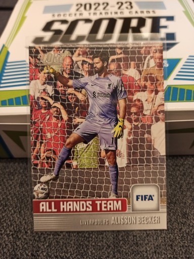 Zdjęcie oferty: 2022-23 Fifa Score - Alisson Becker - insert