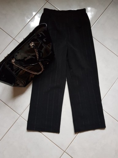 Zdjęcie oferty: spodnie z kantem dzwony ze srebrną nitką lejace