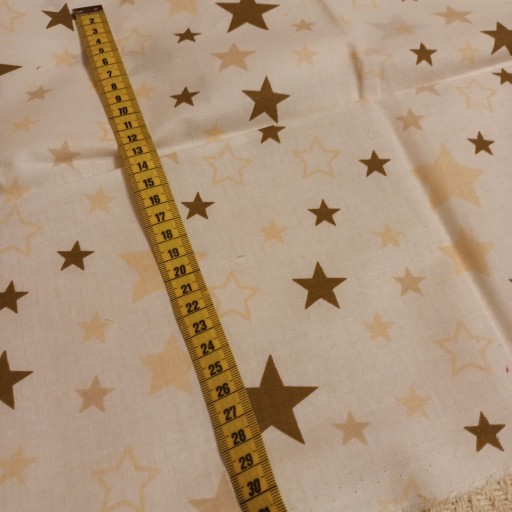 Zdjęcie oferty: Końcówka Bawełna gwiazdy beż brąz łosoś 50x135cm 