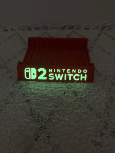 Zdjęcie oferty: Stojak Podstawka na gry Nintendo Switch 2 napis fluorescencyjny