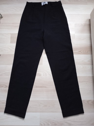 Zdjęcie oferty: Eleganckie włoskie czarne spodnie marki Roman's 