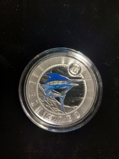 Zdjęcie oferty: Sprzedam srebrną monetę z serii Cayman Islands "Merlin"-1oz.-1dollar