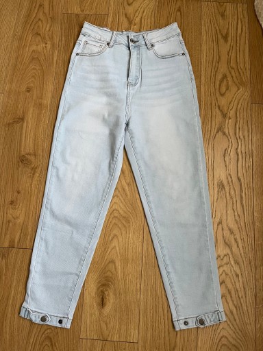 Zdjęcie oferty: Spodnie dżinsowe z patkami