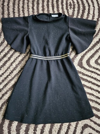 Zdjęcie oferty: Sukienka (tunika) dla dziewczynki ozmiarze 134