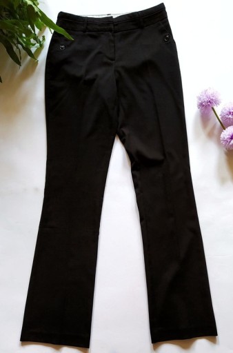 Zdjęcie oferty: Stylowe spodnie damskie z guzikami 36 S