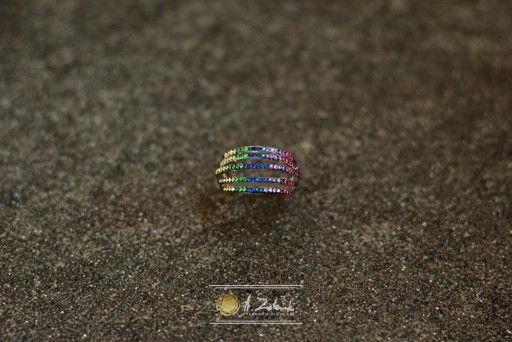 Zdjęcie oferty: Szeroki pierścionek z kolorowymi oczkami. Srebro