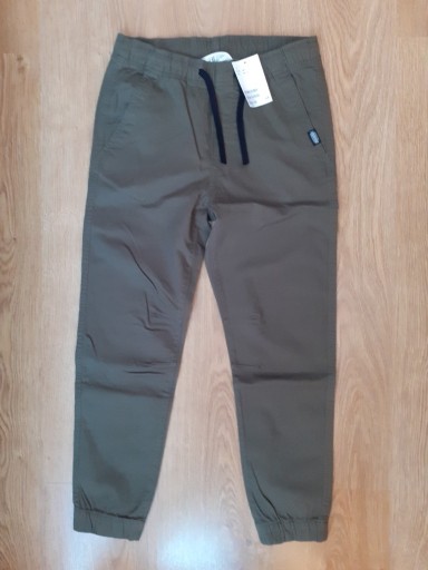 Zdjęcie oferty: H&M - NOWE bawełniane joggery r.146