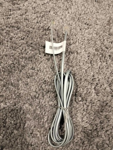 Zdjęcie oferty: Kabel telefoniczny RJ 11 srebrny 2m