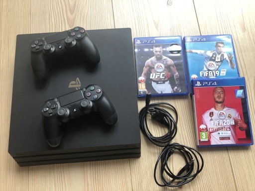 Zdjęcie oferty: Sprzedam zestaw Konsola PS4 + gry