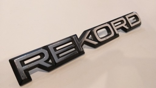 Zdjęcie oferty: Emblemat oryginalny metal logo napis Opel Rekord