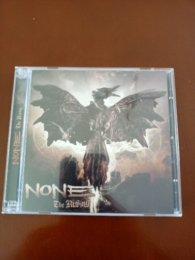 Zdjęcie oferty: None Rising CD+dvd