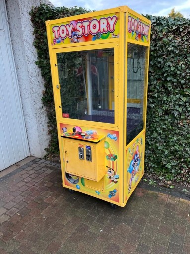 Zdjęcie oferty: ŁAPA,MASKOCIARA  -TOY STORY -AUTOMAT DO GRY 