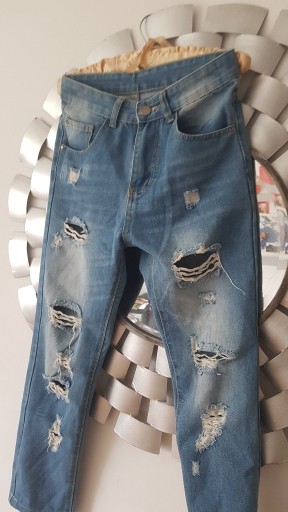 Zdjęcie oferty: Spodnie jeansowe Boyfrend z dziurami 36