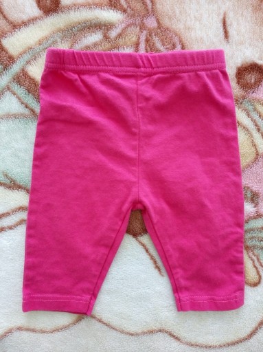 Zdjęcie oferty: Różowe jednokolorowe spodnie legginsy Topolino 62