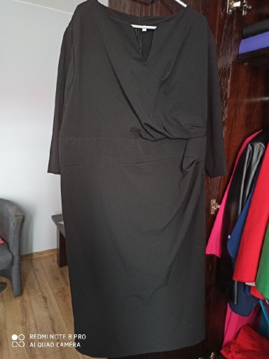 Zdjęcie oferty: Sukienka z tkaniny jak nowa rozmiar 52 54