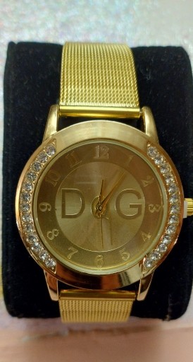 Zdjęcie oferty: Złoty zegarek z diamentami typ DG