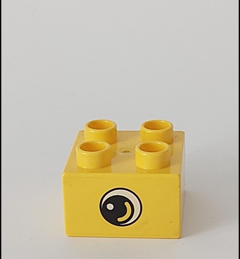 Zdjęcie oferty: Lego Duplo klocek żółty 2X2 oko 