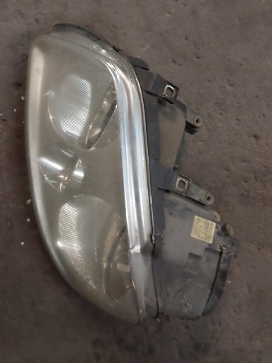 Zdjęcie oferty: 2k0941005b vw caddy lampa reflektor lewy przod 