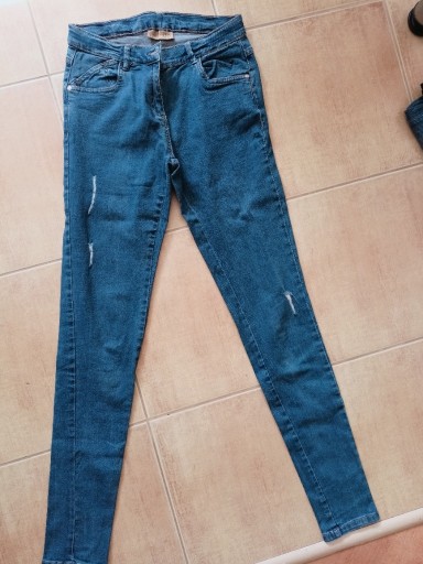 Zdjęcie oferty: Spodnie jeansowe rozmiar 170