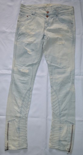 Zdjęcie oferty: Spodnie damskie dżinsowe z rozdarciami Slim roz.40