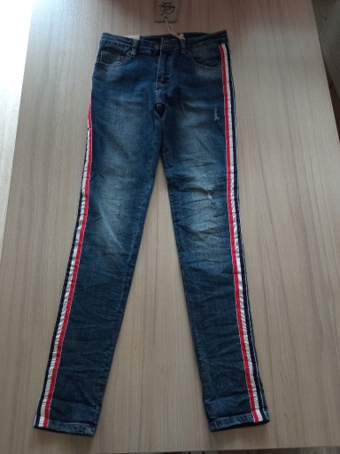 Zdjęcie oferty: nowe spodnie jeansy dla dziewczynki rozmiar S