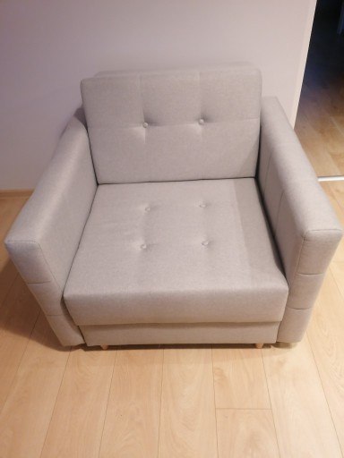 Zdjęcie oferty: Szary rozkładany fotel w stanie idealnym 