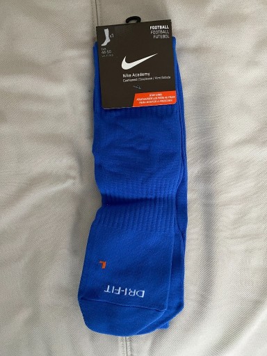 Zdjęcie oferty: Getry piłkarskie Nike niebieski r. 46-50