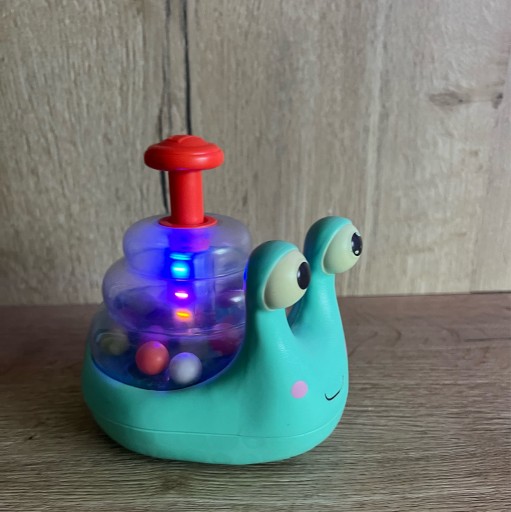 Zdjęcie oferty: Świecący i jeżdżący ślimak z kulkami B.Toys BX1561