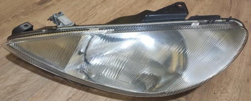 Zdjęcie oferty: Lampa przednia lewa Peugeot 206 1.4i