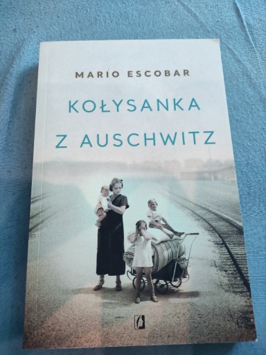 Zdjęcie oferty: Kołysanka z Auschwitz - Mario Escobar - ideał 