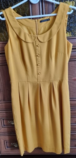 Zdjęcie oferty: Sprzedam sukienkę w piaskowo-żółtym kolorze. " M"