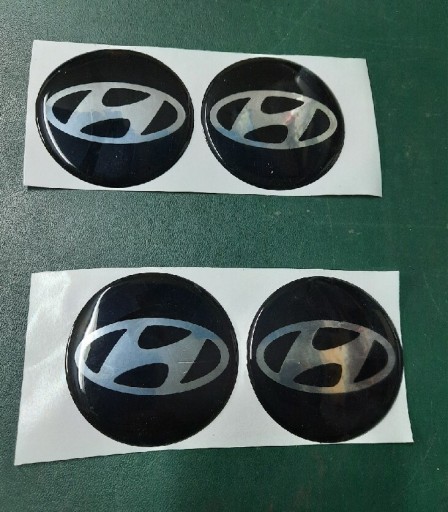 Zdjęcie oferty: Wypukłe emblematy na koła Hyundai 70mm