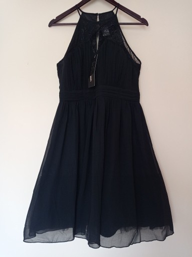 Zdjęcie oferty: Rozkloszowana sukienka w rozmiarze 42/XL