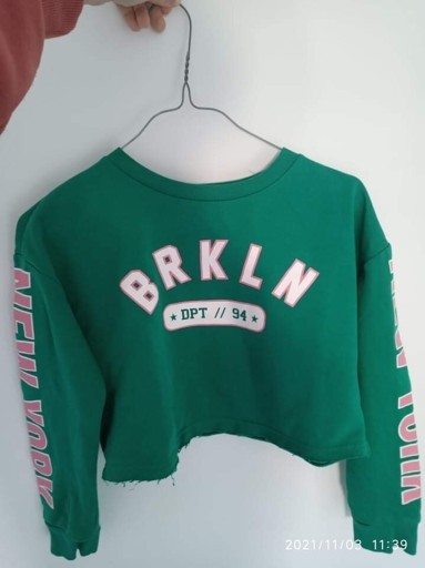 Zdjęcie oferty: Zielona bluza krótka 134 140 H&M