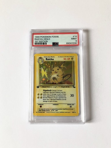 Zdjęcie oferty: PSA 9 Pokemon Raichu Holo Fossil 14/62 1st edition