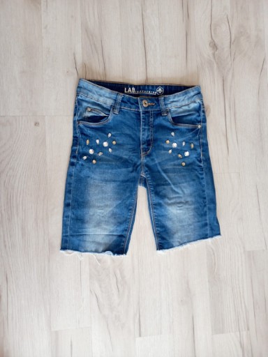 Zdjęcie oferty: Krótkie spodenki jeansowe dziewczęce r 140