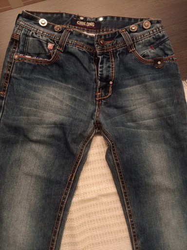 Zdjęcie oferty: Spodnie jeansy chłopięce chi long r. 134 x 140