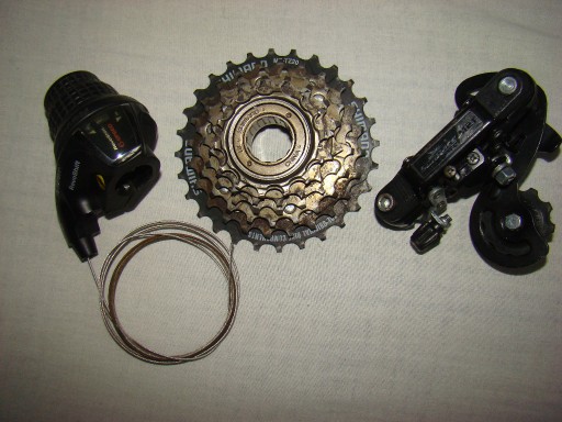 Zdjęcie oferty: WOLNOBIEG SHIMANO MF-TZ20,  SUN RACE M2T, MANETKA REVO SHIFT 6 SPEED