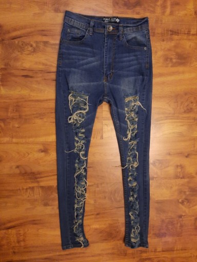 Zdjęcie oferty: Spodnie jeansowe jeansy rozdarciami Punny Jeans L