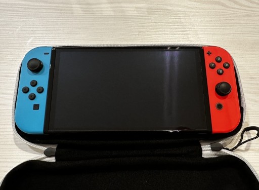 Zdjęcie oferty: Nintendo Switch OLED + 4 gry + pokrowiec