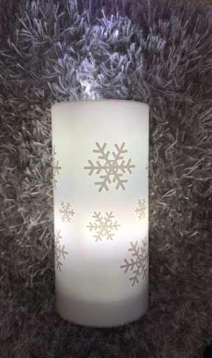 Zdjęcie oferty: Świeca LED z projektorem płatków śniegu