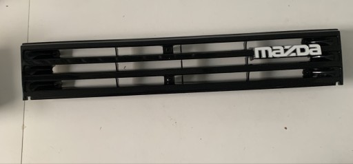 Zdjęcie oferty: Mazda 323 85r Grill atrapa chłodnicy 